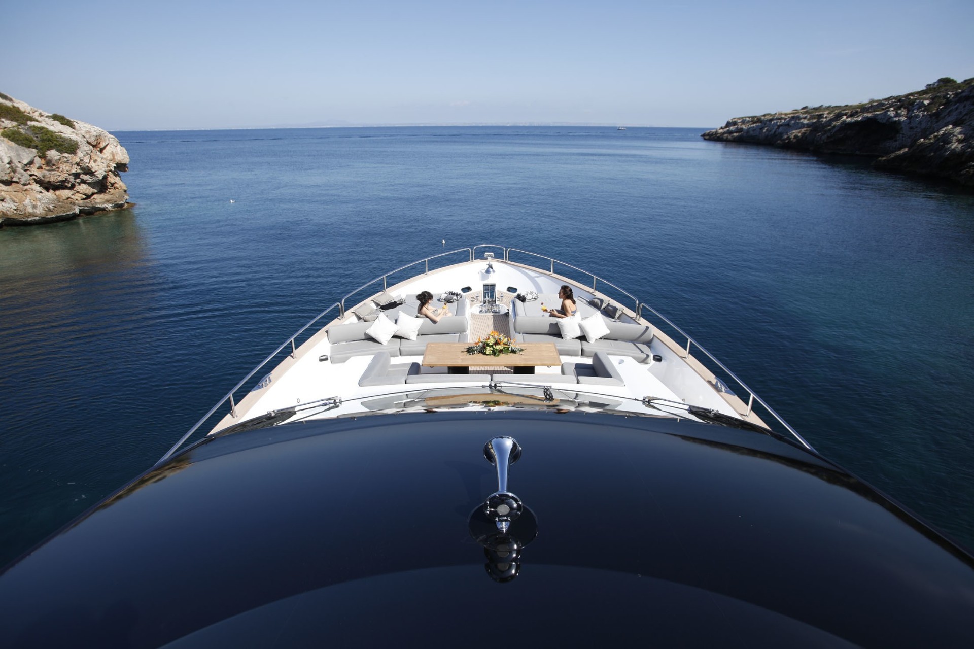 Oasis bow at anchor in a quiet cove
